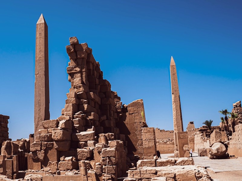 Colonnade at Karnak Temple with towering stone pillars